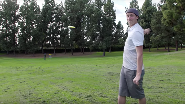 Watch this incredible no-look disc-golf ace